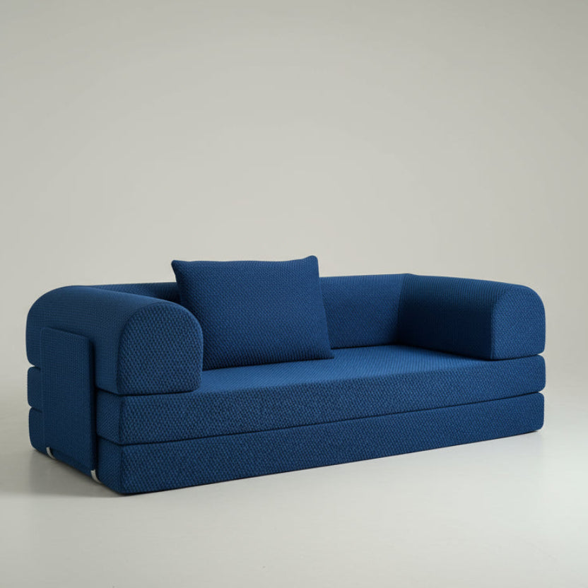 Blue Phaf sofa with plush cushions and sleek design, showcasing comfortable seating in a modern living room setting.