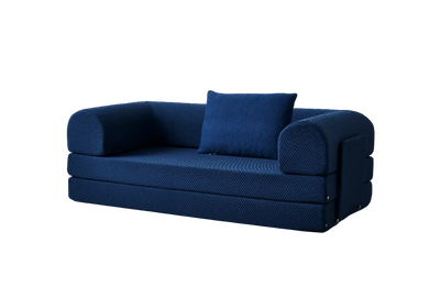 Phaf sofa with plush cushions and modern design, featuring light gray upholstery and sleek wooden legs.