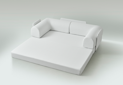 Phaf sofa with plush cushions and modern design, featuring neutral fabric upholstery and sleek wooden legs.