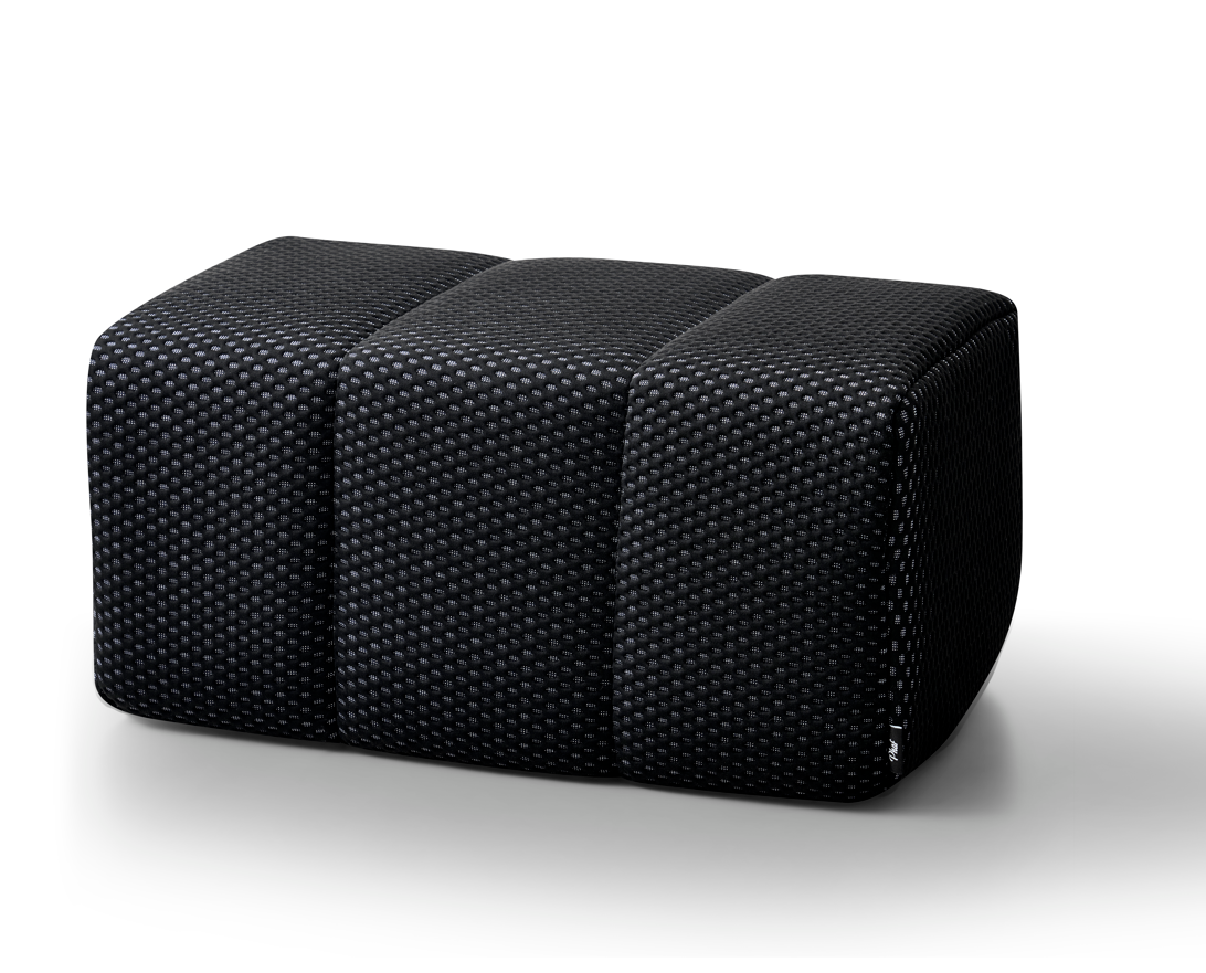 Black Toto Ottoman by Phaf showcasing a sleek, modern design with plush upholstery and sturdy wooden legs.