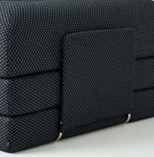Black sofa with supporting bars from Phaf, showcasing the sturdy frame and modern design in a living room setting.