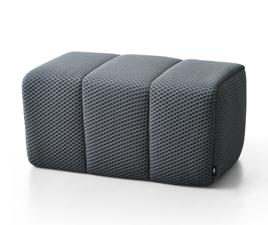 Gray Toto Ottoman by Phaf, showcasing its soft fabric upholstery and plush cushioned top for comfortable seating or footrest use.