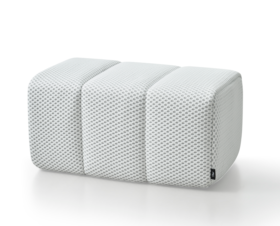 White Toto Ottoman by Phaf featuring a soft cushioned top and wooden legs, ideal for living room or bedroom decor.