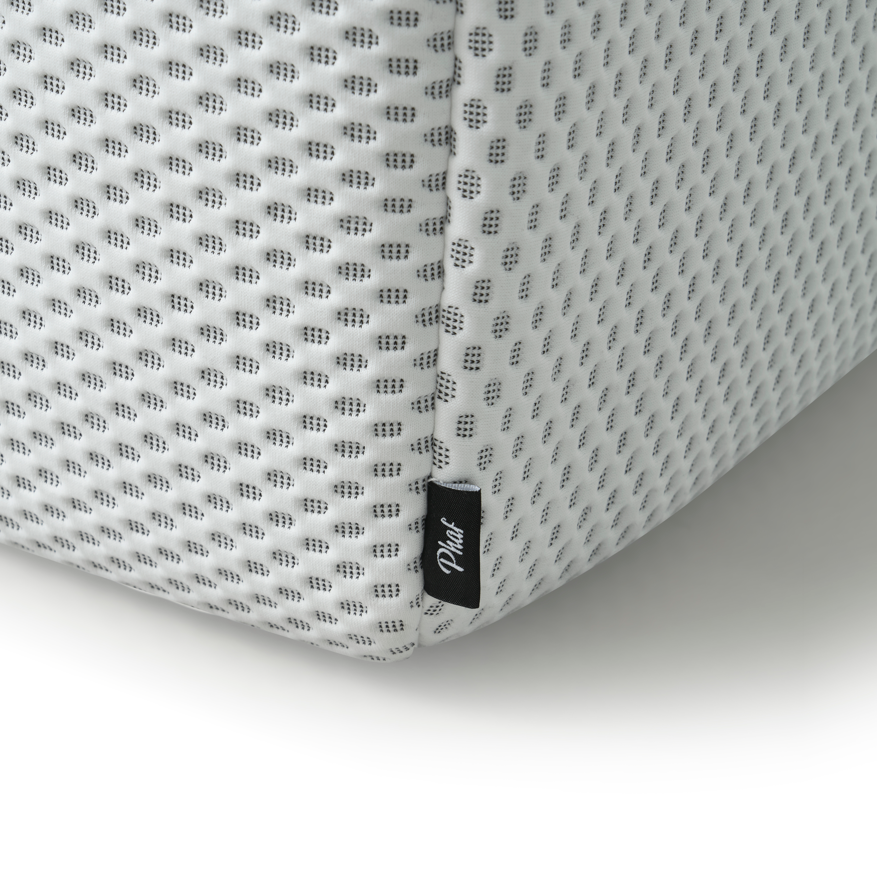 White Toto Ottoman by Phaf, modern fabric storage ottoman with cushioned top and sleek design for living room decor.